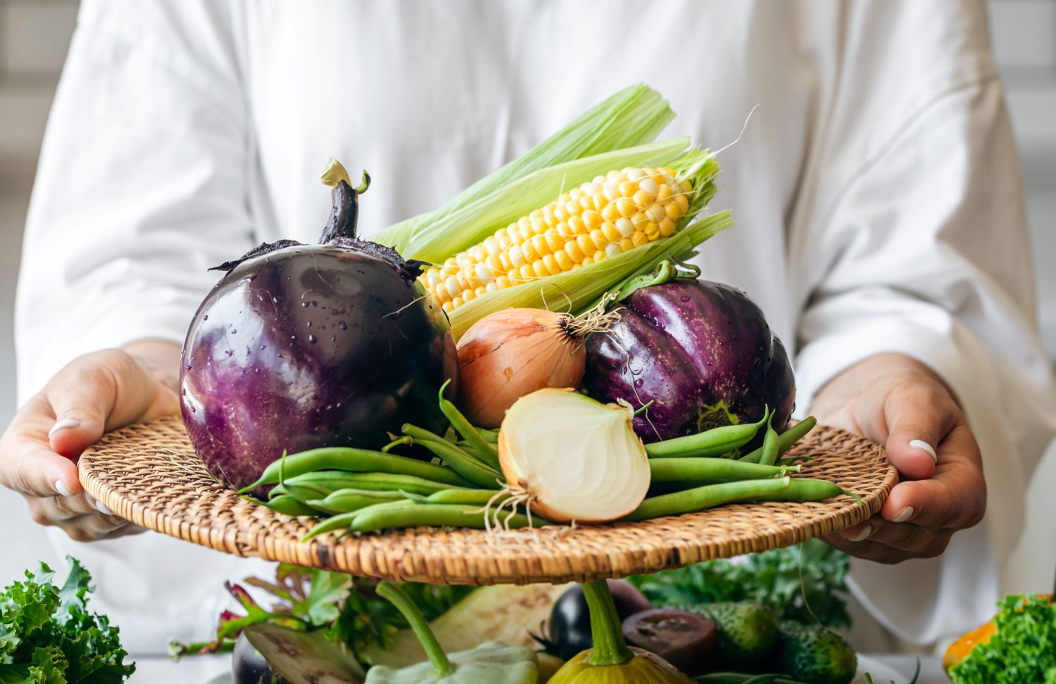 woman holding vegetables